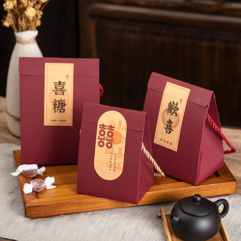 结婚订婚伴手礼喜糖盒2025高档手提新款喜糖袋纸盒牛皮纸婚礼新婚
