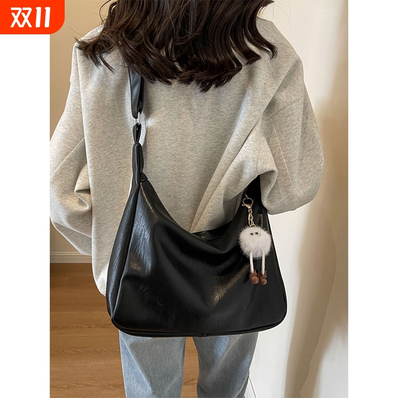 伊布古奇大容量包包女2025新款时尚百搭休闲单肩包学生通勤斜挎包