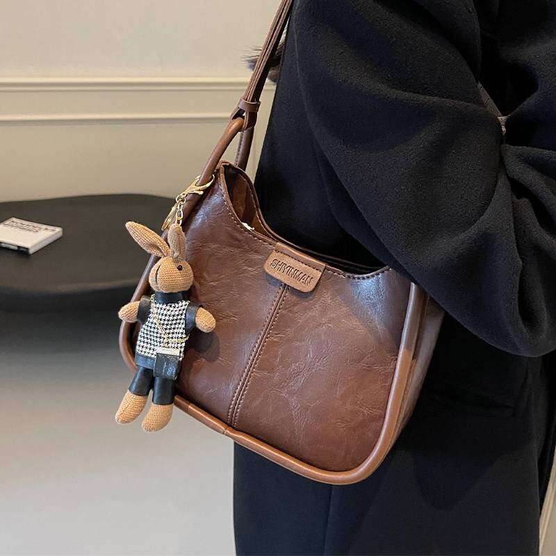 爱马女仕高级感包包女年春夏流行复古单肩腋下包通勤斜挎水桶包