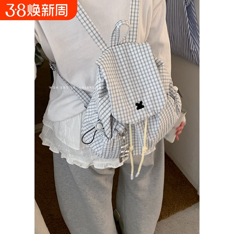 格子帆布登山包包女2025新款潮韩国学院双肩包休闲背包单肩水桶包