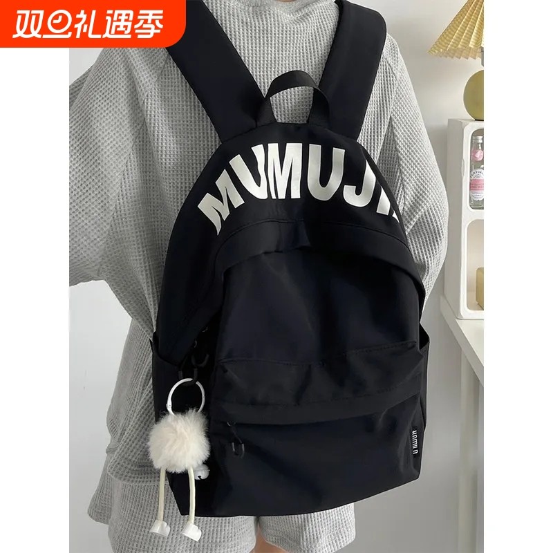 金玉鸟字母大容量书包小众时尚百搭休闲双肩包轻便减负尼龙防水