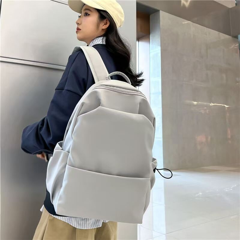 高端2026年新款运动书本通勤大容量电脑包双肩包黑色防水灰色帆布