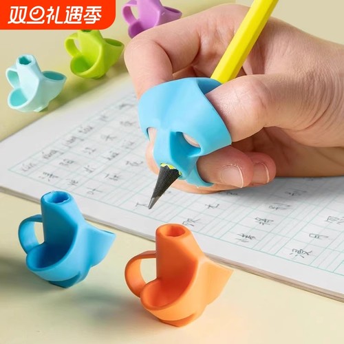 幼儿园入门三指全定位握笔器小学生握姿神器初学者纠正握笔姿势抓笔训练器儿童学习文具用品批发中指指尖写字