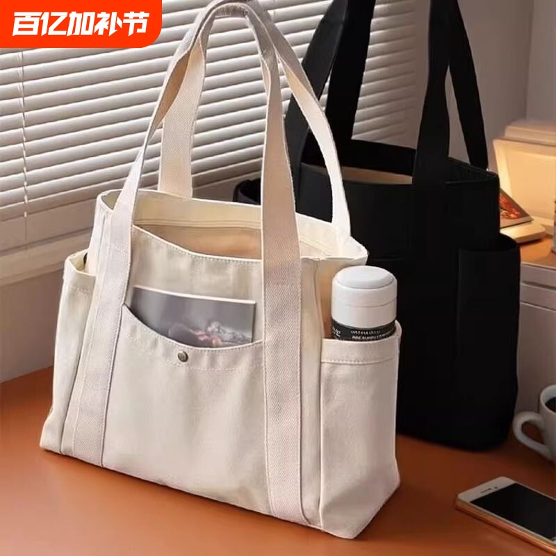 大容量托特帆布包女2026新款上班高颜值通勤百搭学生单肩手提包包