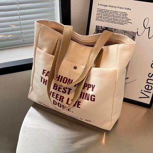 帆布包2024新款 大容量女设计师托特包上班通勤学生手提收纳购物袋