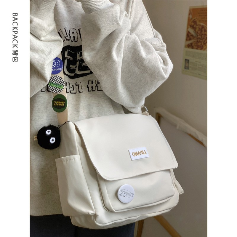 ins大学生斜挎包上课潮流背包单肩包休闲包包女原宿日系邮差包男