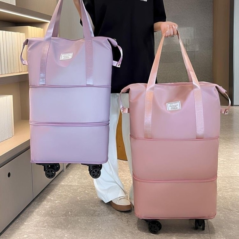 旅行大容量拆卸万向轮收纳包旅行便携双层托运包学带轮大容量包