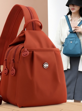 背包女2025时尚胸包休闲百搭女士双肩背红色牛津布单肩手提出门