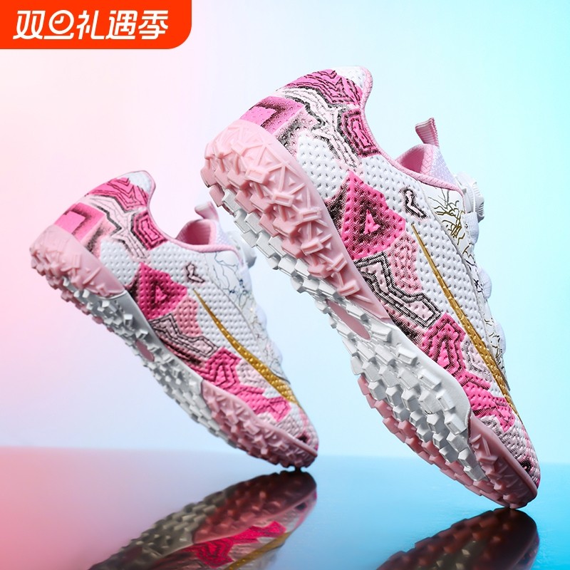 新款专业足球鞋女孩旋转扣碎钉儿童小学生专用比赛训练鞋长钉短钉