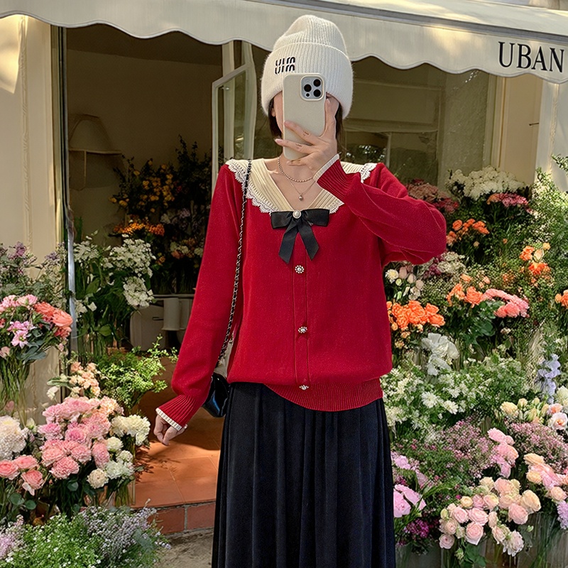 加大码时尚纯色V领蝴蝶结毛衣女