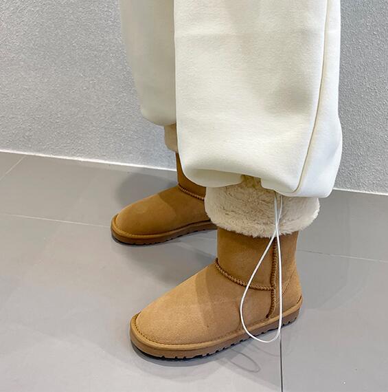 韩国人造皮毛一体中筒雪地靴可卷边平底厚实棉鞋