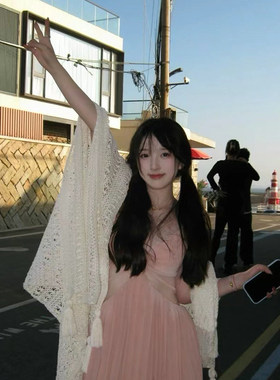 森系白色镂空针织披肩女2025新款春秋民族风拍照外搭披风斗篷外套