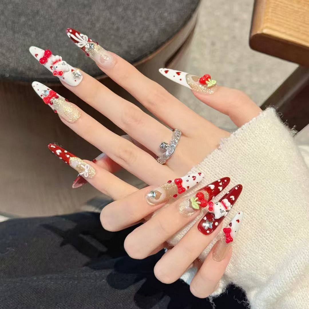 圣诞新年氛围感可爱kitty显白美甲温柔酒红法式香槟金猫眼蝴蝶结