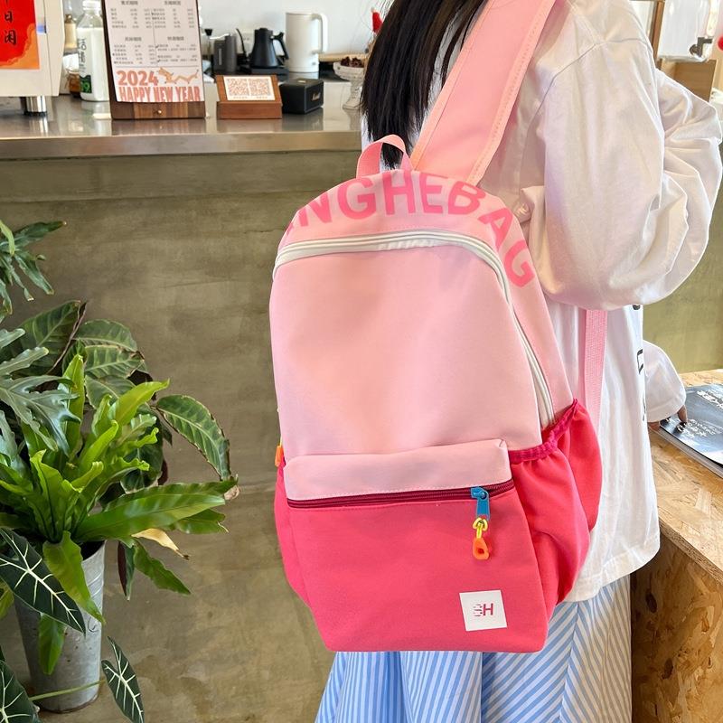ins日系撞色休闲双肩包 男大容量背包女初中生高中大学生书包定制