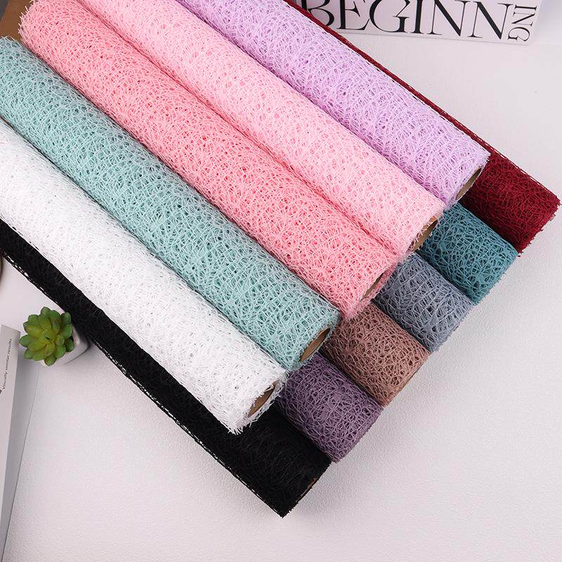 现货供应新款提花网 花束包装纸材料镂空鲜花提花网花店用品定制