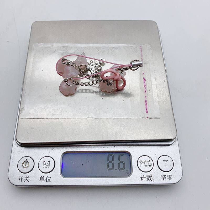 新款铃兰花串镂空领结钥匙扣挂件创意蝴蝶金属配件耳机套包包挂饰