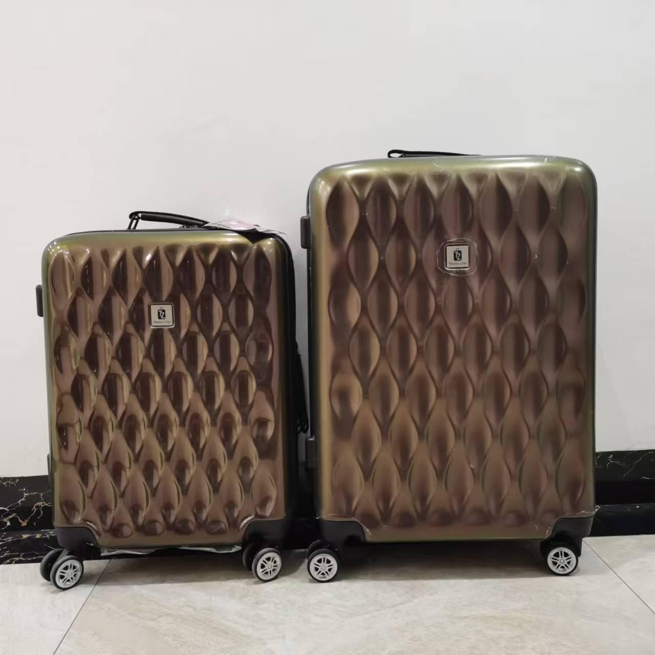 乐扣铠甲型拉杆箱商务万向轮