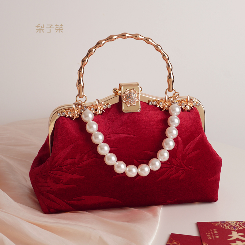 中式红色旗袍手提包包