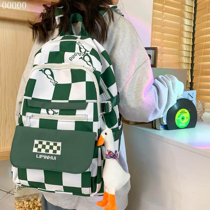 高档潮牌棋盘格书包女初中生大容量克莱因蓝小众日韩大学生双肩包