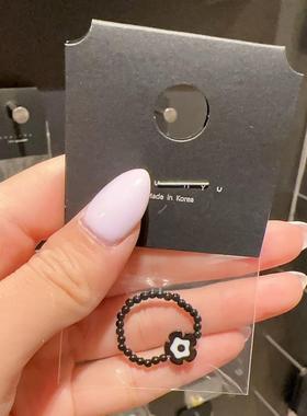 0825韩国东大门代购戒指nyunyu黑色花朵串珠戒指叠戴可爱早春指环