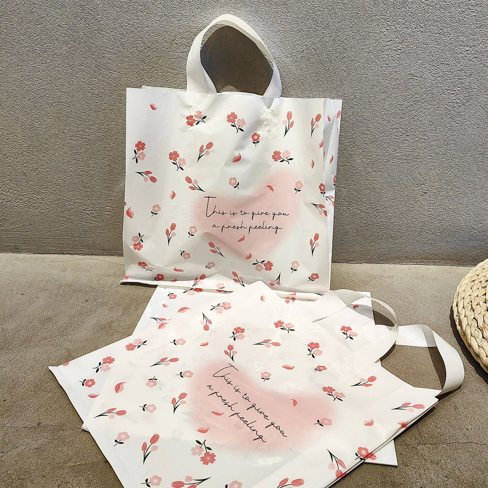 小碎花服装店手提袋礼品袋塑料袋包装袋女装店购物袋胶袋口袋定制