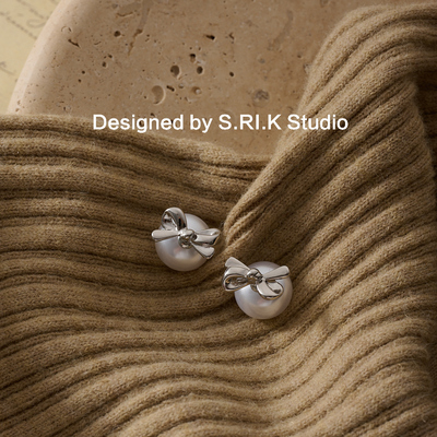 十里间甜美蝴蝶结珍珠两戴款耳环