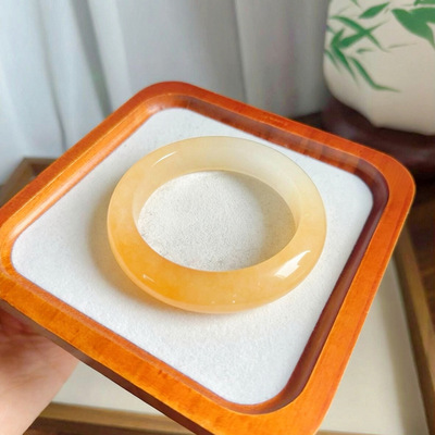 天然橘黄色黄龙玉一口糖镯子冰种