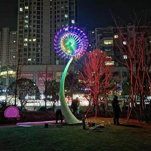 不锈钢风动雕塑城市亮化发光风车太阳花造型景区公园互动游乐设备