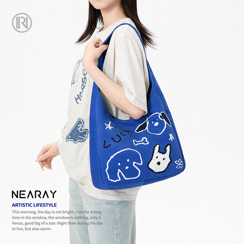 尼睿新款原创可爱小狗单肩包克莱因蓝大容量日常通勤帆布包Q309,箱包皮具/热销女包/男包,时尚帆布包,淘宝优惠券,粉丝福利购,淘宝优惠卷