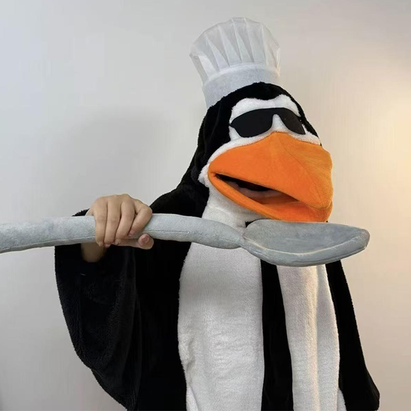 高端人士企鹅睡衣高雅女款2025新款冬珊瑚绒加厚抽象搞怪连体衣家