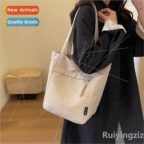 Large-capacy canvas bag female 2023 fall hundred shoulder bu