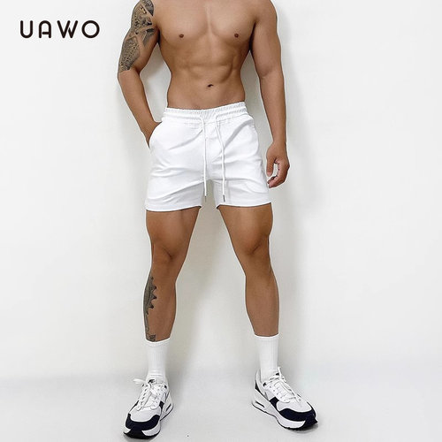 uawo夏季纯色短裤男速干透气弹力松紧带休闲运动跑步健身三分短裤