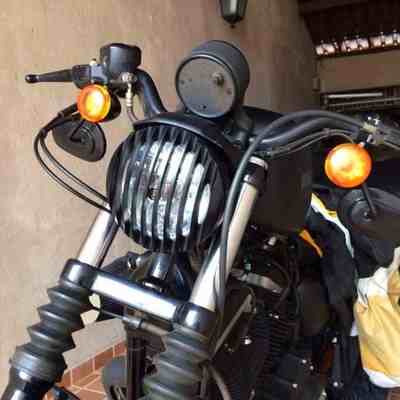 摩托车博格奔达250原驰兽BD400戴娜哈雷XL883N改装铝栅栏前大灯罩