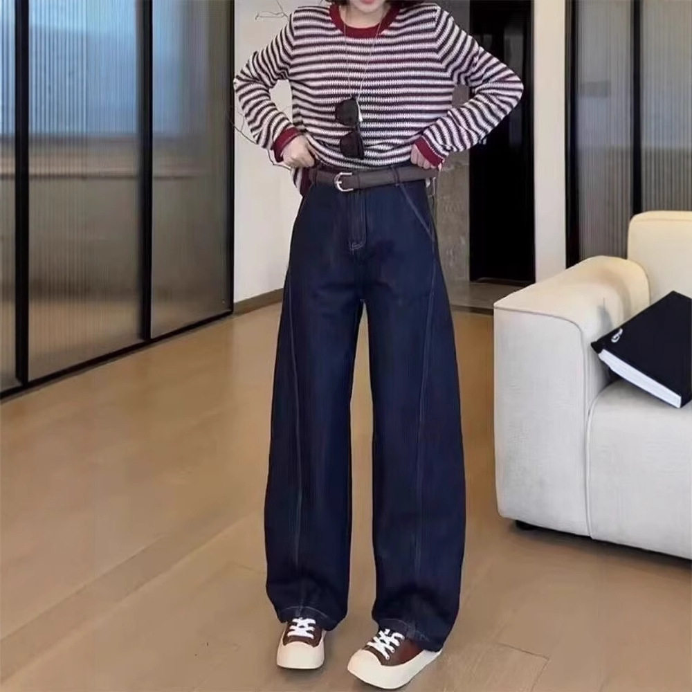 欧货蓝色百搭弧形弯刀窄版牛仔裤女早秋2026年新款遮胯显瘦休闲裤