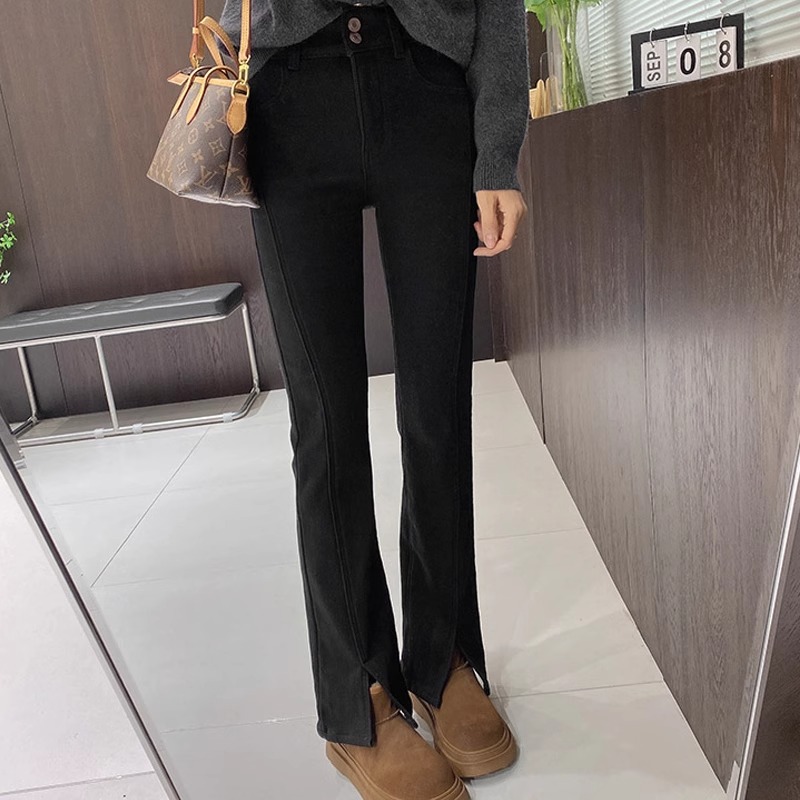 弹力设计感微喇开叉牛仔裤