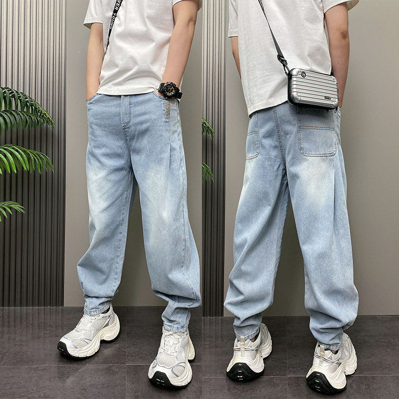 夏季薄款潮牌韩版痞帅松紧腰蓝色水洗磨白青年男士束脚哈伦牛仔裤
