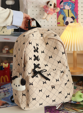 新款灯芯绒蝴蝶结书包女大学生百搭双肩包小众初中高中生韩版背包