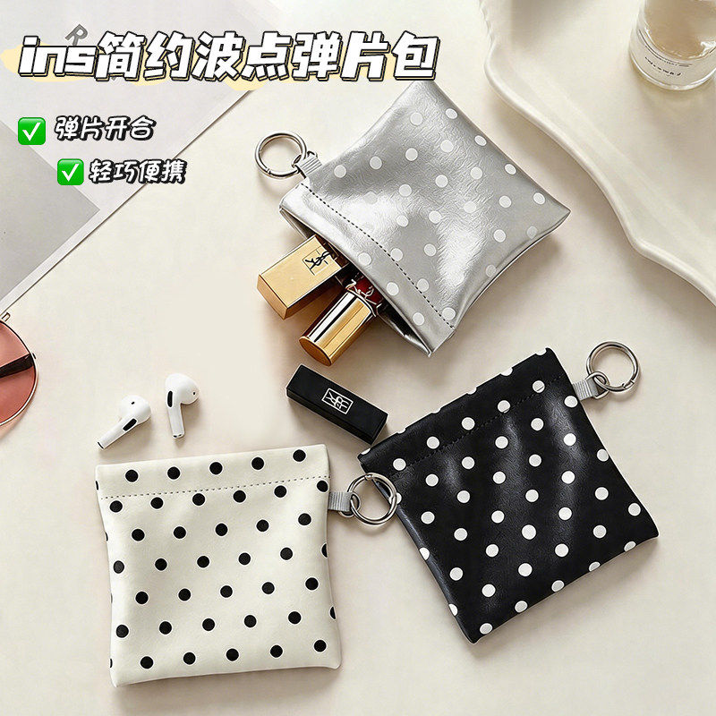简约波点弹片化妆包PU皮防水手拿便携外出旅行收纳包随身简约包女