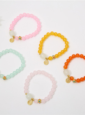 Crystal beaded bracelet with female lucky character charm