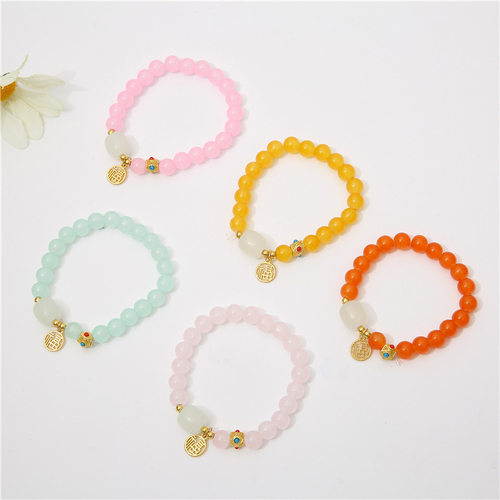 Crystal beaded bracelet with female lucky character charm