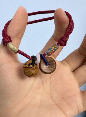 Peach wood peach basket peace charm bracelet with red string