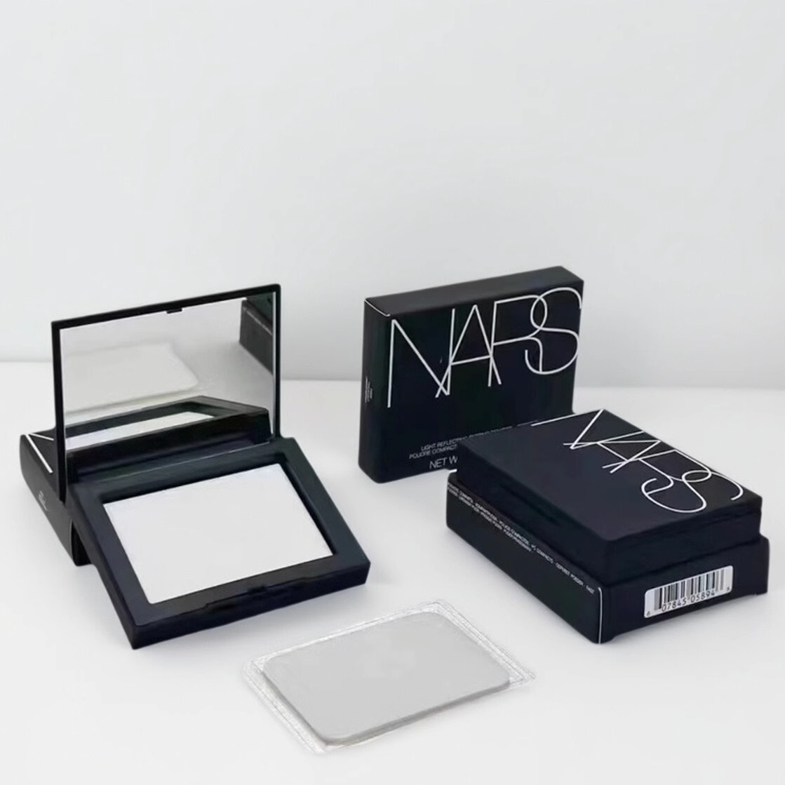 NARS/纳斯大白饼裸光透明定妆蜜粉饼轻薄持久控油带细闪 10g