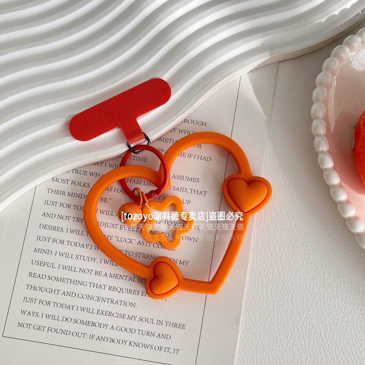 可爱橙色手机链挂绳手环扣挂饰高端液态硅胶手腕绳适用iPhone1