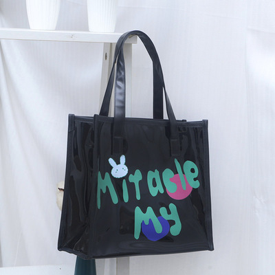 尚盈绿色兔子防水大容量通勤包