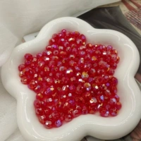 Красные роговые бусины разных размеров (50 г в пакетике)