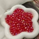 Красные роговые бусины разных размеров (50 г в пакетике)