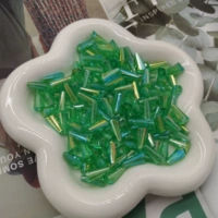 Зеленые бусины в виде капель воды разных размеров (50 г в пакете)