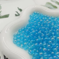 Голубые бусины разных размеров (50 г в пакетике)