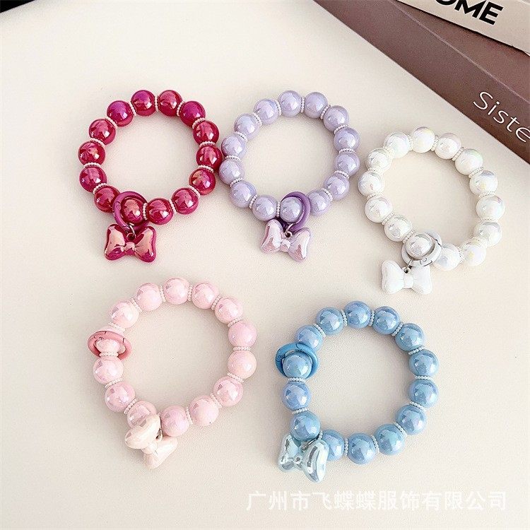 新款蝴蝶结幻彩串珠手机链简约短款手机挂绳可爱糖果色手机壳定制