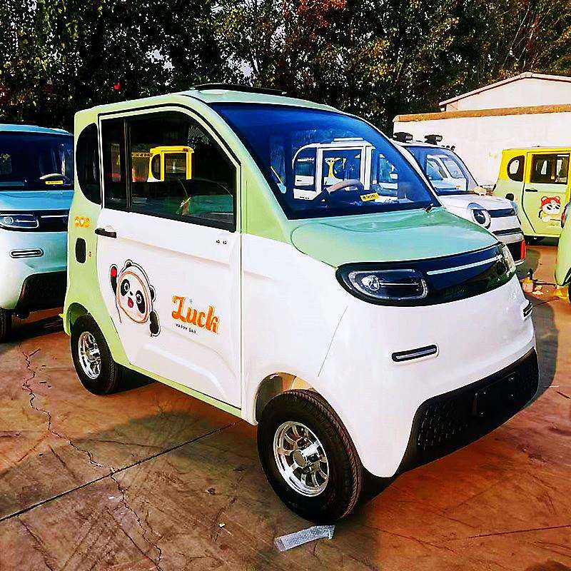 迷你电动四轮车两门四门可选择全封闭接送孩子电动轿车